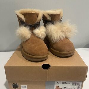 UGG Gita Tan Boots with Cream Fur Pom Poms